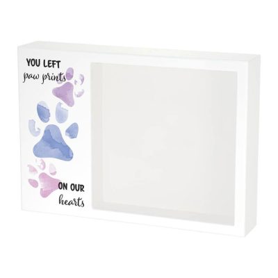 Shadowbox Pet Urn with purple paw prints and text that says you left paw prints on our hearts