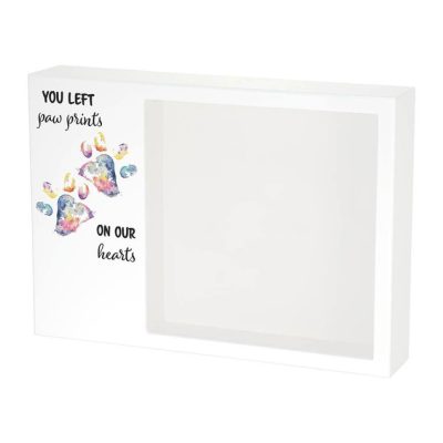 Shadowbox Pet Urn with rainbow paw prints and text that says you left paw prints on our hearts